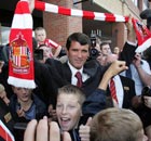 Roy Keane with fans following a press conference at the Stadium of Light, Sunderland in August 2006 