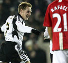 Kris Commons celebrates