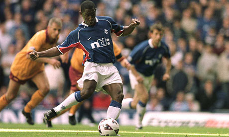 Russell Latapy misses from the penalty spot for Rangers