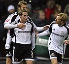 Kris Commons and Derby celebrate