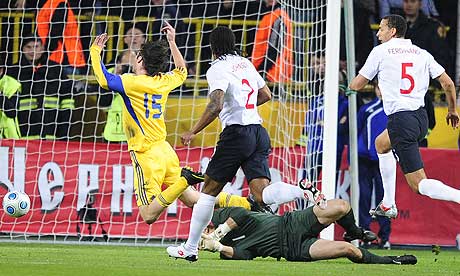 Robert Green fouls Artem Milevskiy to concede a penalty