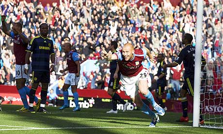 James Collins celebrates putting Aston Villa 2-1 up against Chelsea