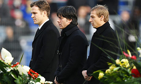 Oliver Bierhoff, Joachim Loew and Juergen Klinsmann at the memorial service for Robert Enke
