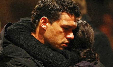 Michael Ballack comforts Teresa Enke during the church memorial service