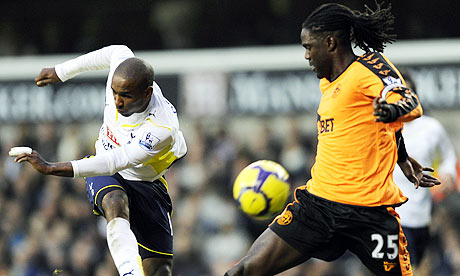 Mario Melchiot is little more than a spectator as Jermain Defoe scores in the 9-1 win for Spurs