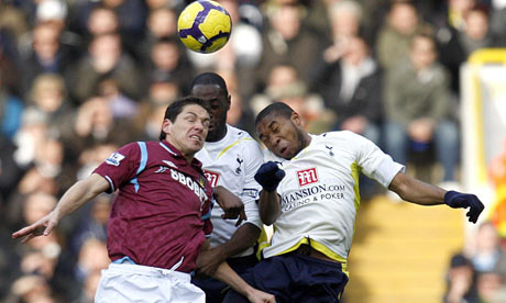 Ledley King, of Tottenham, centre