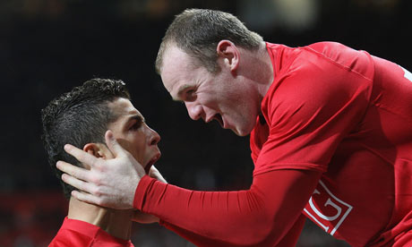 Cristiano Ronaldo and Wayne Rooney celebrate Manchester United's second goal