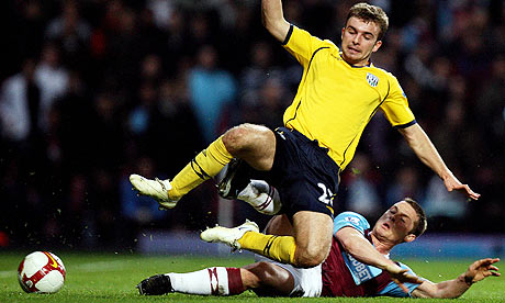 West Ham's Scott Parker tackles James Morrison