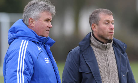 Guus Hiddink, with Chelsea owner Roman Abramovich, says he will leave the club in May