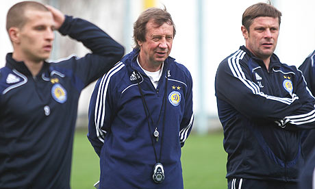 Head coach of Dynamo Kyiv Yurii Semin, centre, with coach Oleg Luzhniy and Alexander Aliev