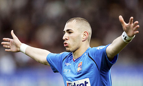 Lyon's Karim Benzema celebrates one of his two goals in the 31 victory over