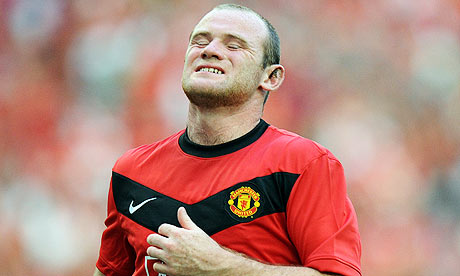 wayne rooney fotos. Wayne Rooney reacts after