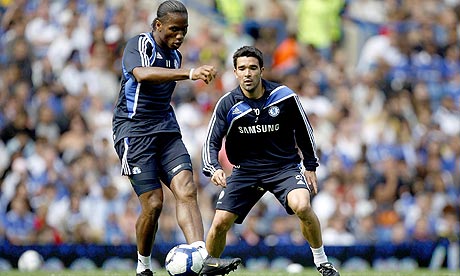 Didier Drogba and Deco during a training session at Stamford Bridge today