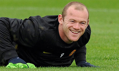 Manchester United's English forward Wayne Rooney takes part in a training session