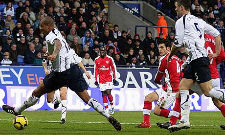 Cesc Fabregas shoots and scores