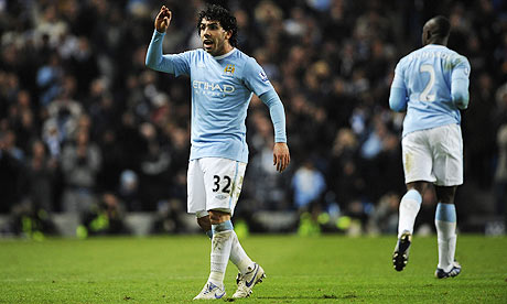 Carlos Tevez gestures to Gary Neville, Manchester City v Manchester United