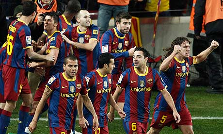 Barcelona's players celebrate during the 5-0 hammering over Real Madrid