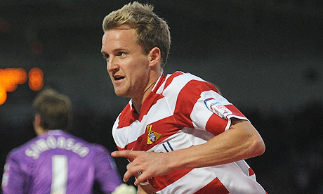 Doncaster Rovers' James Coppinger celebrates