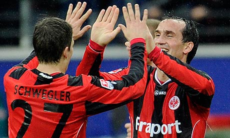 Frankfurt's Theofanis Gekas, right, and Pirmin Schwegler celebrate during the win over Wolfsburg