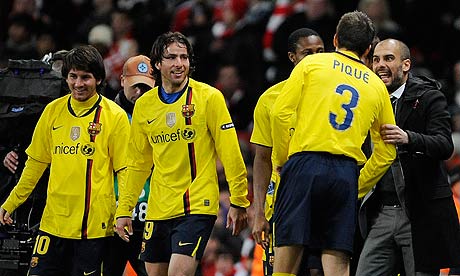 Pep Guardiola (right) celebrates with his Barcelona players