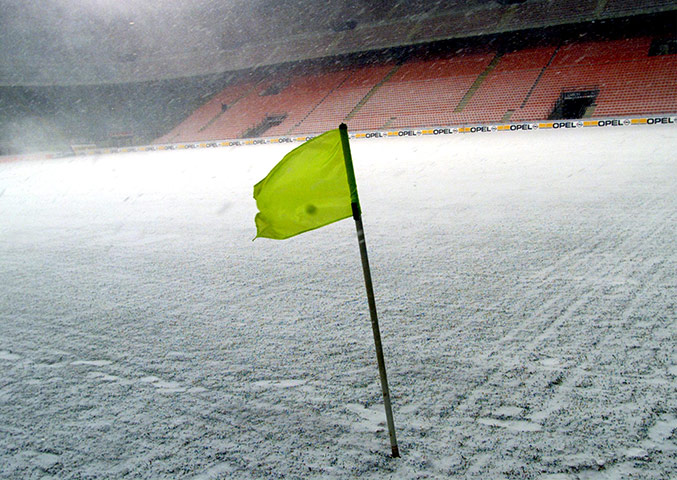 Football white-outs: The San Siro is empty as the game between Milan and Lazio is called off