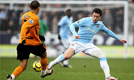 Wayne Bridge Hull's Craig Fagan tangles with Manchester City's Wayne Bridge 