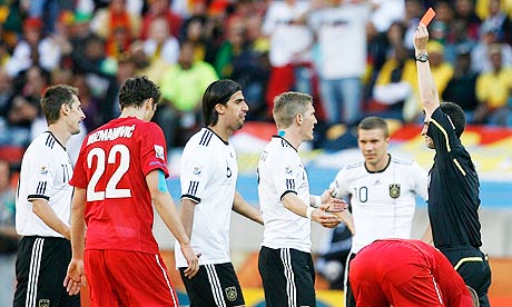 Germany's Miroslav Klose, far left, is sent off by referee Alberto Undiano against Serbia