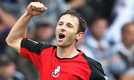 Marc Pugh celebrates scoring the third goal for Bournemouth at Tranmere