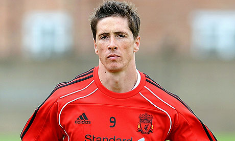 Fernando Torres has returned to training at Liverpool following Spain's