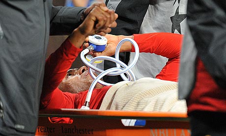 Manchester United's Antonio Valencia is stretchered off
