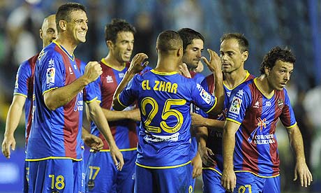 Levante's players celebrate against Malaga
