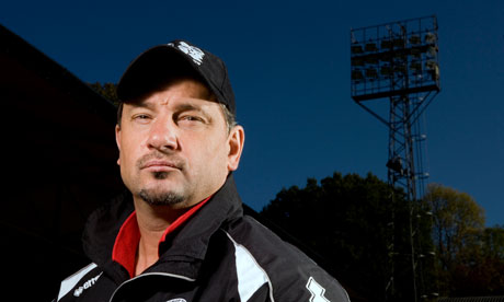 The Aldershot manager, Dean Holdsworth, poses