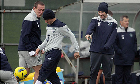Republic of Ireland's Robbie Keane, right, and Richard Dunne, left, share a joke