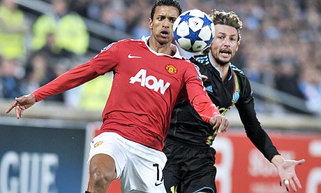 Manchester's United Nani and Gabriel Heinze of Marseille