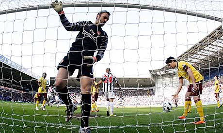 Arsenal pick the ball out of their net