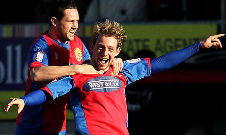 Dagenham & Redbridge's Danny Green, right, celebrates with Mark Arber during the win over Charlton