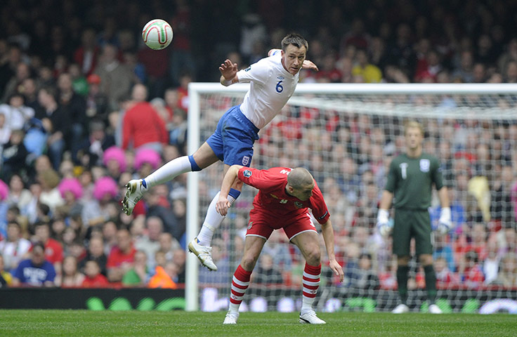 Wales v England: John Terry beats Steve Morison in the air