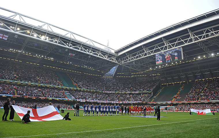 Wales v England: The two teams line up for the national anthems