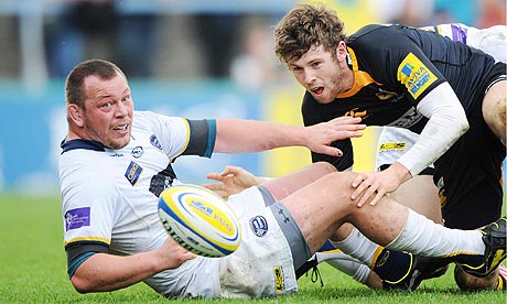 Elliot Daly of Wasps in action against Steve Thompson of Leeds