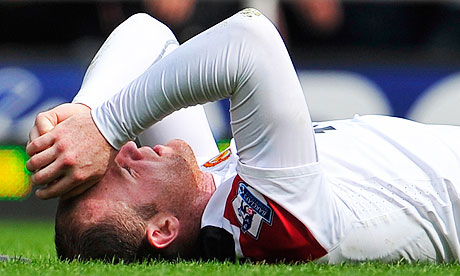 Manchester United's Wayne Rooney suffers in the first half at West Ham United