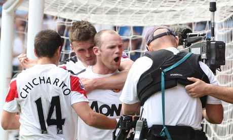 Wayne Rooney of Manchester United celebrates his hat-trick goal in the 4-2 win at West Ham