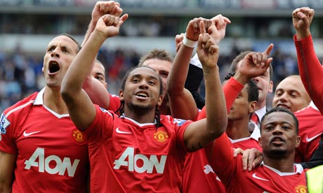 Manchester United's players celebrate winning the Premier League