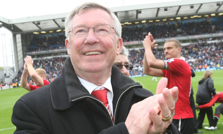 Sir Alex Ferguson celebrates a 19th title