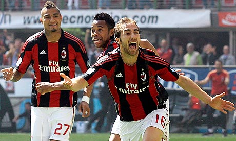 Mathieu Flamini celebrates after scoring Milan's winner in the victory over Bologna