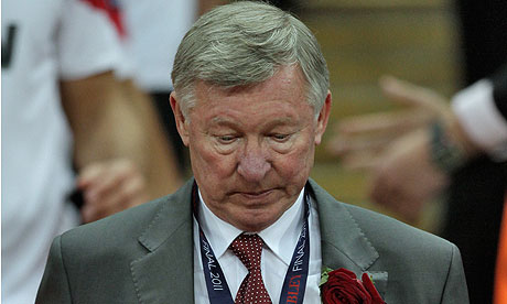 Sir Alex Ferguson descends the Wembley steps after collecting his losers' medal.