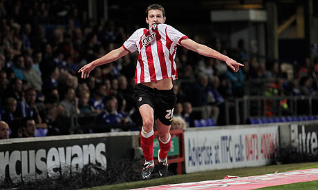 Southampton's Adam Lallana celebrates scoring his side's fourth goal at Ipswich