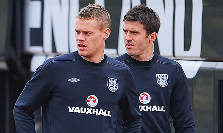 Ryan Shawcross, left, with Michael Carrick of Manchester United at an England training session