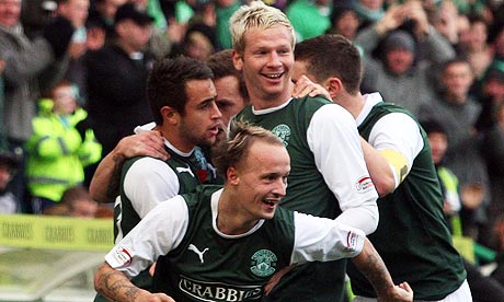 Leigh Griffiths, front, celebrating with his team-mates