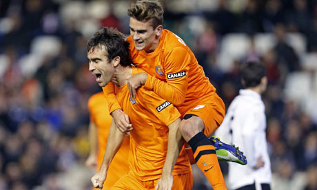 Real Sociedad's Mikel Gonzalez celebrates with Antoine Griezmann after scoring their team's second