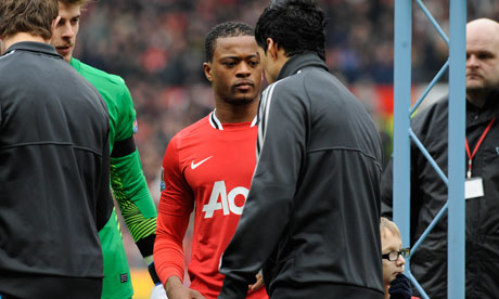 Luis Suarez refuses to shake hands with Patrice Evra